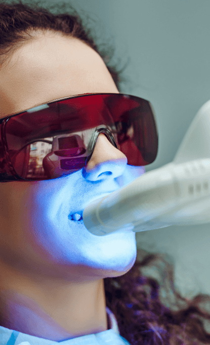 Patient receiving teeth whitening