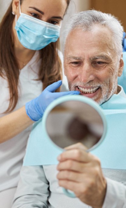 Man with dental crowns in Denver