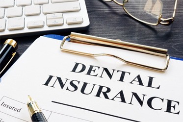 Dental insurance paperwork in Denver 
