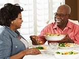 a mature couple enjoying a healthy and nutritious meal