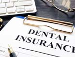 dental insurance form on table