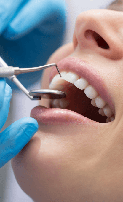 Closeup of patient receiving scaling and root planing treatment
