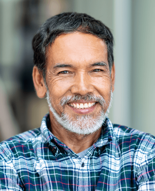 Man with healthy smile after restorative dentistry